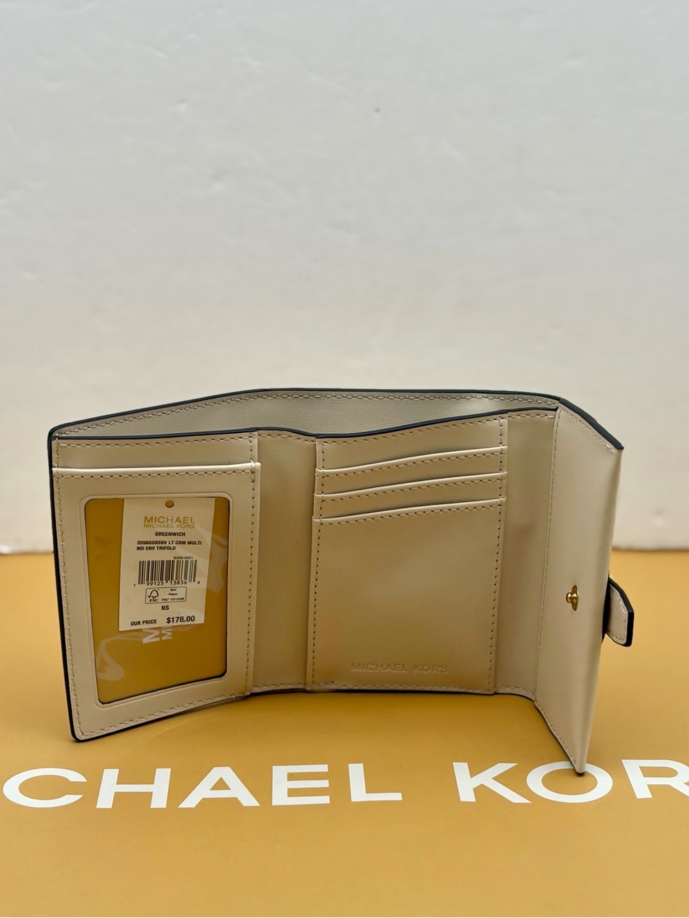 Michael Kors Ivory Compact Wallet with Pink Floral Accents - Picture 6 of 12